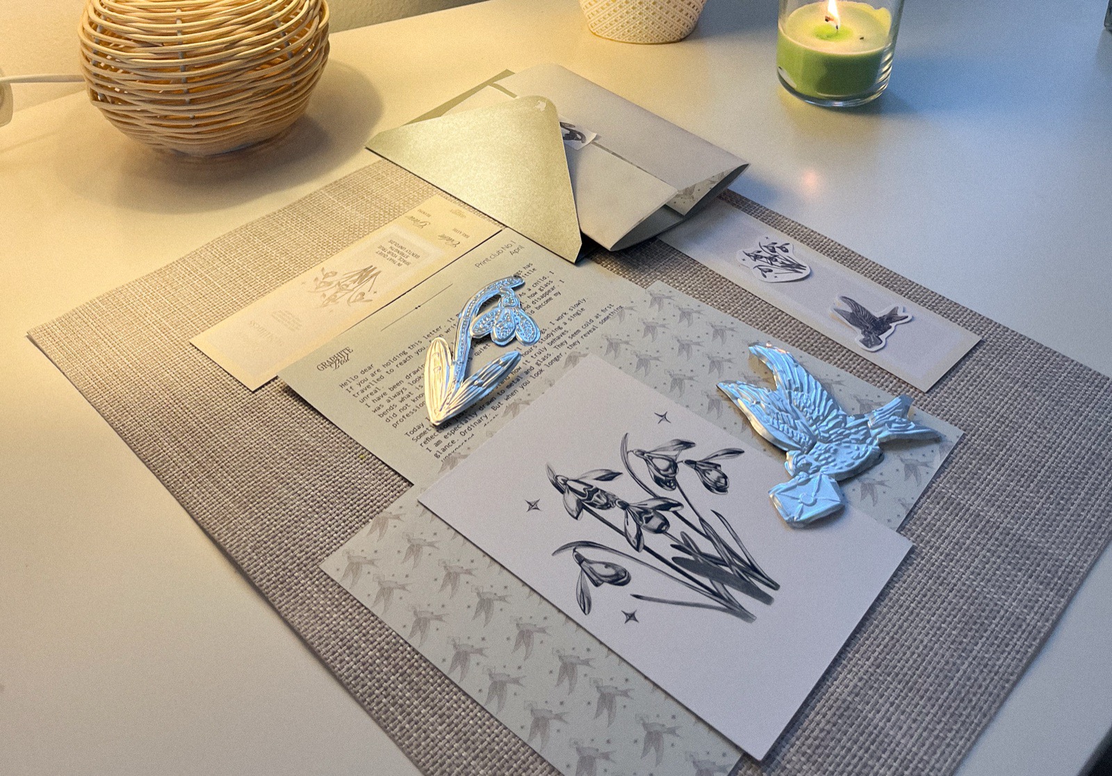 Package contents spread out under warm lamplight